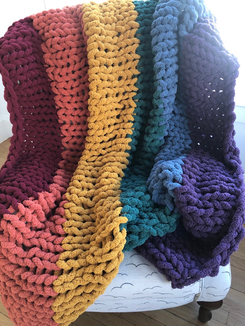 Beautiful handmade chunky knit blankets in a variety of colors, sizes and personalize with custom colors.  Ultra soft and cozy, machine washable and kid and pet friendly.  Chenille yarn that does not shed.  Perfect for gift giving or yourself!