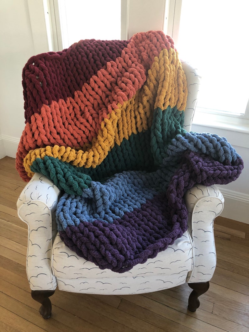 Beautiful handmade chunky knit blankets in a variety of colors, sizes and personalize with custom colors.  Ultra soft and cozy, machine washable and kid and pet friendly.  Chenille yarn that does not shed.  Perfect for gift giving or yourself!