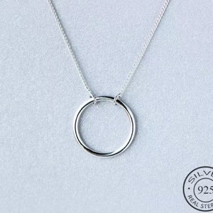 Vintage signed TCI 925 sterling silver pendant necklace with circle pendant with encrusted zircon