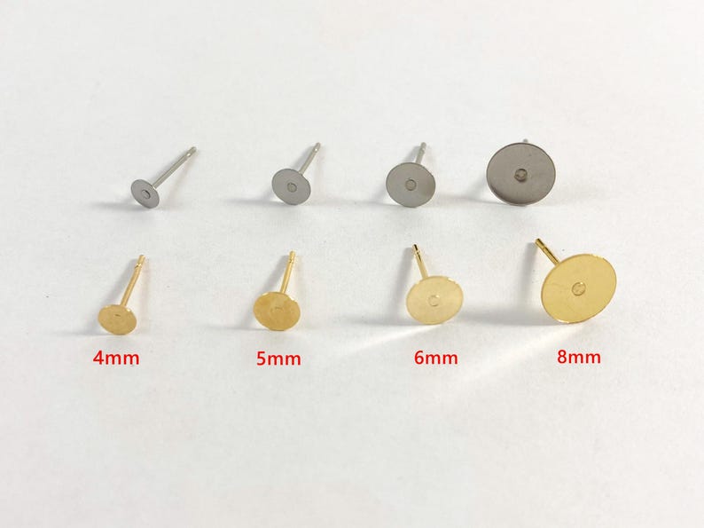May include: Assortment of earring post backs in silver and gold tones. The post backs are round and come in four sizes: 4mm, 5mm, 6mm, and 8mm.