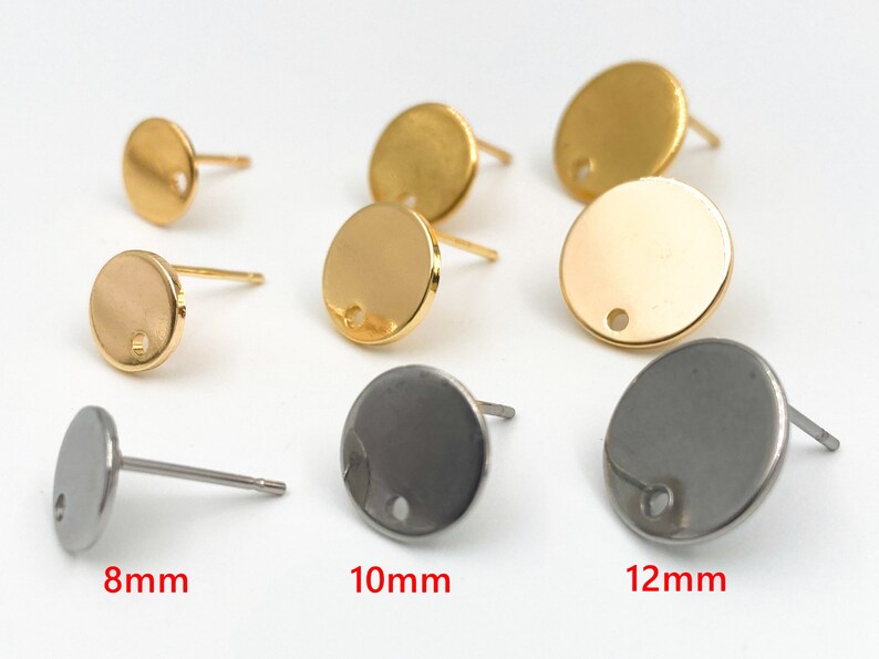 May include: Three sizes of round earring blanks, 8mm, 10mm, and 12mm, in gold and silver.