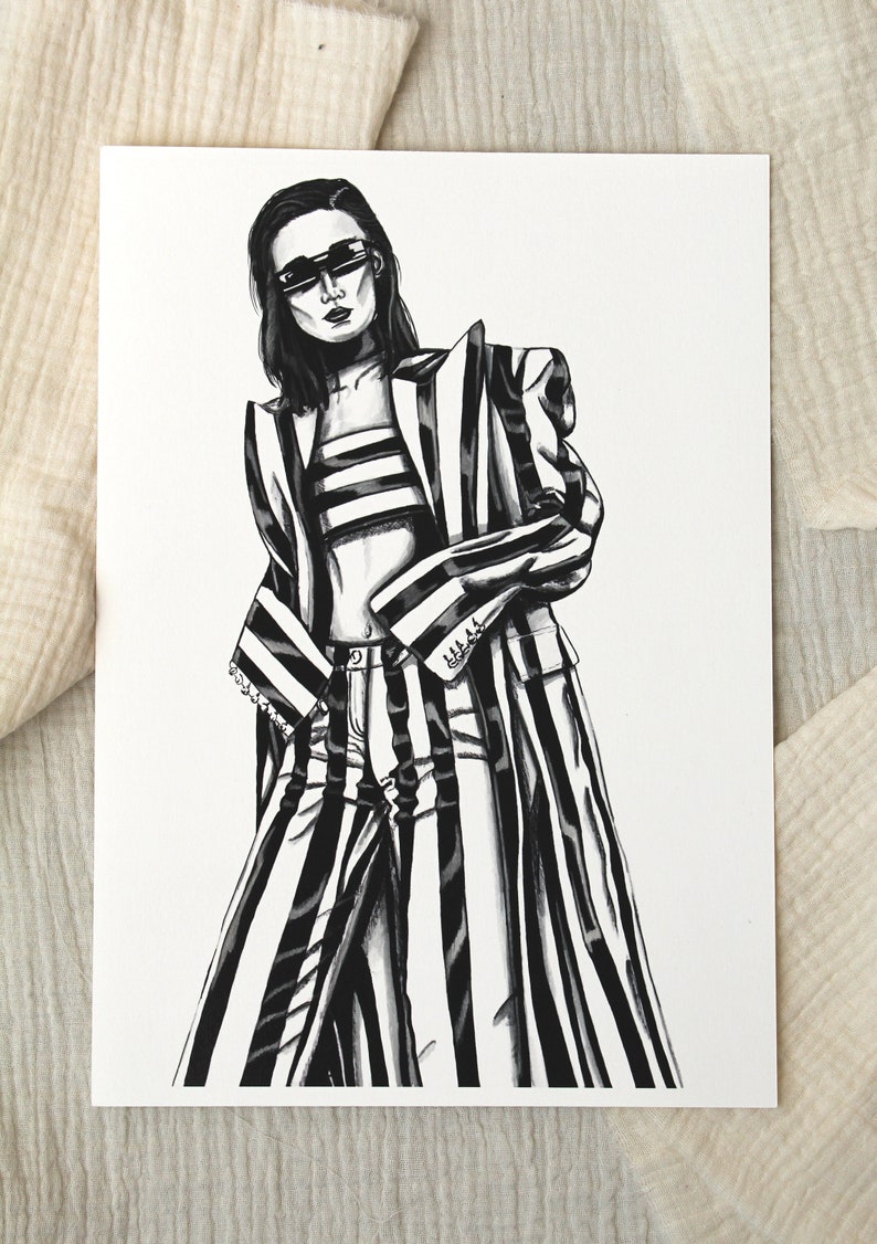 May include: Black and white illustration of a person wearing a striped blazer and trousers. The person is wearing sunglasses and has short hair.