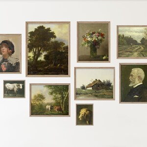 May include: A gallery wall with nine framed paintings. The paintings depict a variety of subjects, including landscapes, portraits, and still lifes. The frames are all made of wood and have a light brown finish.