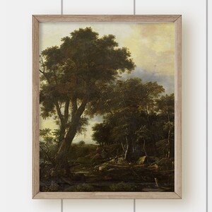 May include: A framed oil painting depicting a landscape scene with a large tree in the foreground and a river flowing through a forest. The sky is a pale yellow with clouds.