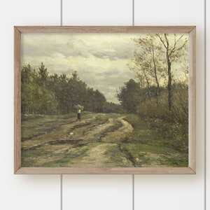 May include: A framed painting depicting a rural landscape with a dirt road winding through a forest. The sky is overcast with clouds, and a lone figure walks along the road.