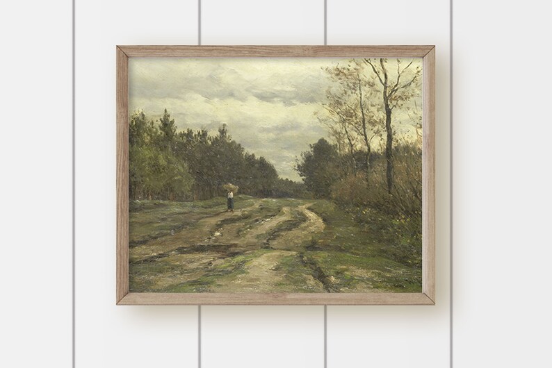May include: A framed painting depicting a rural landscape with a dirt road winding through a forest. The sky is overcast with clouds, and a lone figure walks along the road.