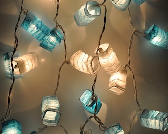 Lucine a forma di stella di carta blu: decorazioni per le feste e per il dormitorio