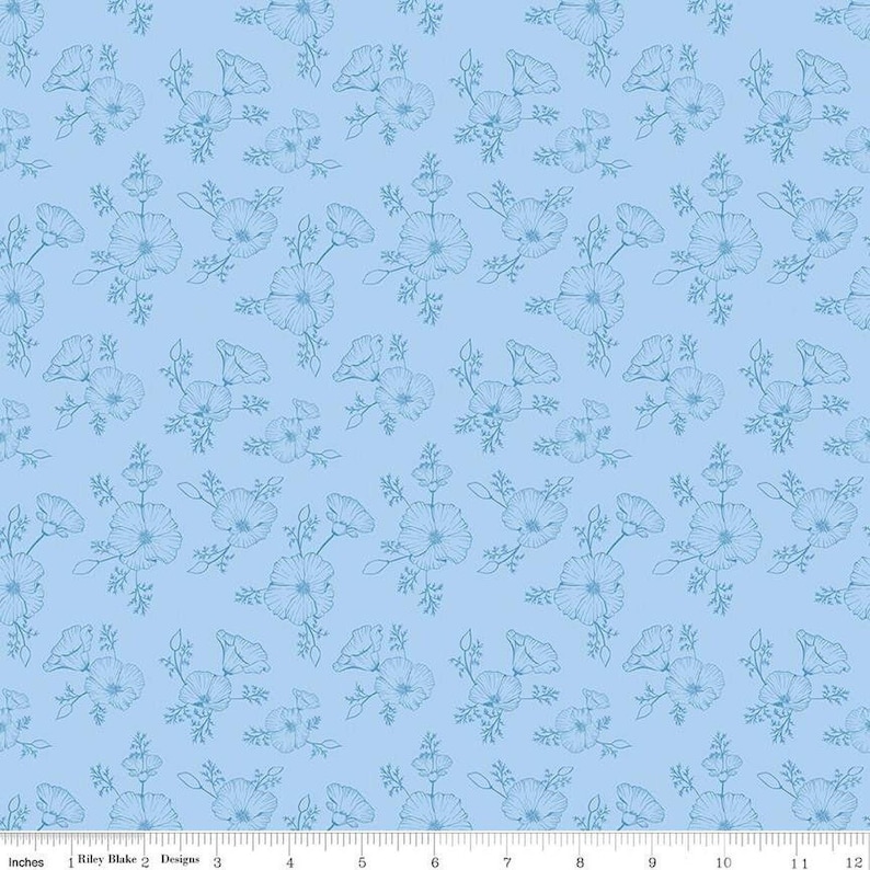 May include: A light blue fabric with a repeating pattern of white outline drawings of flowers. The flowers are stylized and have five petals.