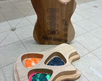 Porta púas de guitarra