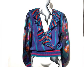 Eye catching fun Vintage 1980s cotton and rayon colorful flounce sweater. Excellent condition.