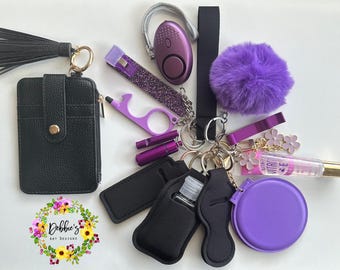 Safety keychains, defense, wristlet, accessories, wallet, Pom Pom, led light alarm, lip gloss, card grabber, mirror, etc, black purple
