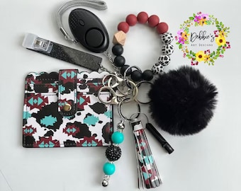 Western cow print, Safety keychains, defense, beaded wristlet, accessories, wallet, led light alarm, whistle, card grabber and more