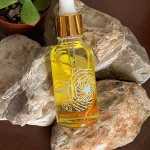 Citrus Turmeric Face and Body Oil light weight face oil infused with Sandalwood all skin types