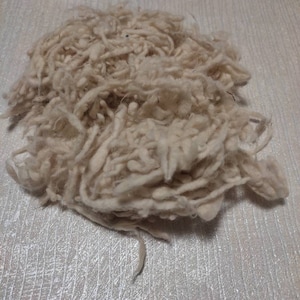 Woolen slubs natural white