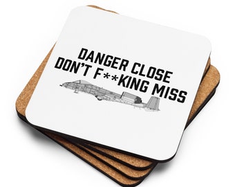 Cork-back coaster with Danger Close message