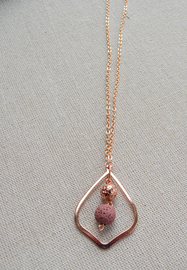 Essential oil diffusing necklace