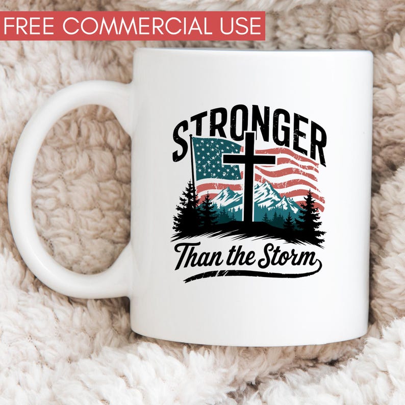 May include: White ceramic mug with a graphic design featuring a cross over an American flag with mountains in the background. The text "Stronger Than the Storm" is printed below the graphic.