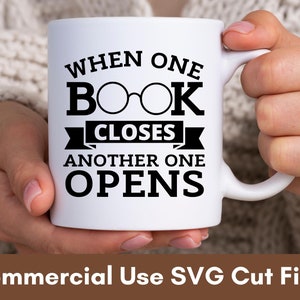 May include: White ceramic mug with a black design that reads "When one book closes another one opens". The design includes a pair of glasses in place of the "O" in the word "book".