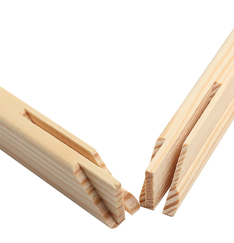May include: Close-up of two wooden stretcher bars for a canvas, showing the interlocking joinery.