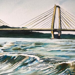 May include: A watercolour painting of a yellow suspension bridge over a river with choppy water. The bridge has a single tower on each side and is surrounded by green trees.