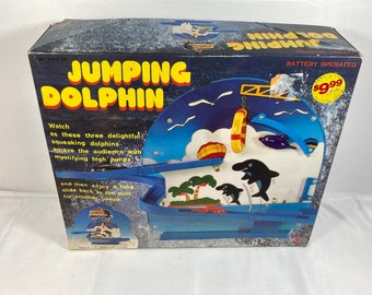 Vintage 1985 Jumping Dolphins Toy