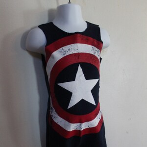 May include: A sleeveless black bodysuit with a red, white, and blue distressed graphic of Captain America's shield.