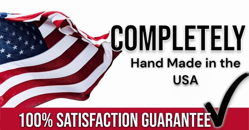 May include: Image shows a waving American flag with the text "COMPLETELY Hand Made in the USA" and "100% SATISFACTION GUARANTEE". The flag has red and white stripes and a blue field with white stars.