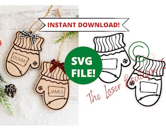 May include: Two wooden Christmas ornaments shaped like mittens with red and black plaid bows. The mittens have a white and black striped cuff and a snowflake design. The ornaments are personalized with the names "Olivia" and "James".