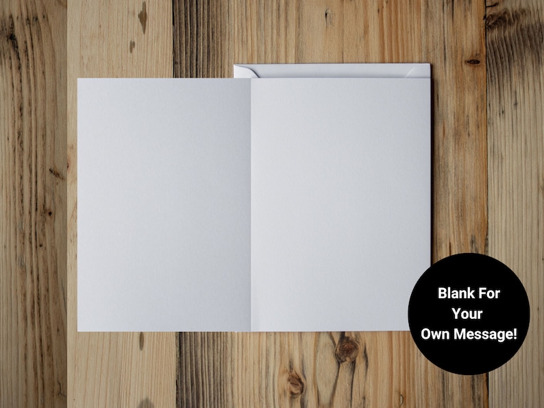 May include: A blank white card with a black circle that says "Blank For Your Own Message!" The card is on a wooden surface.