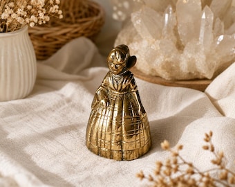 Antique table bell. Lady-shape, bronze from 19th Century