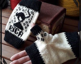 A warm knitted souvenir from Latvia. Funny arm warmers with legendary black cat of Riga.
