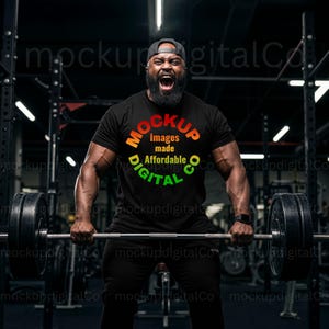 May include: A man wearing a black t-shirt with a colorful circle graphic that says "MOCKUP Images made Affordable DIGITAL CO" is lifting a barbell in a gym.