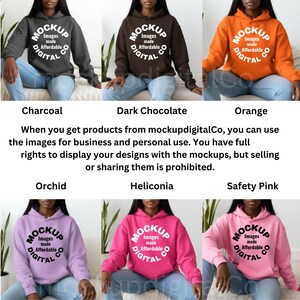 May include: A collection of six hooded sweatshirts in various colors: charcoal, dark chocolate, orange, orchid, heliconia, and safety pink. Each hoodie features a front pocket and a circular logo that says "MOCKUP Images made Affordable DIGITAL".