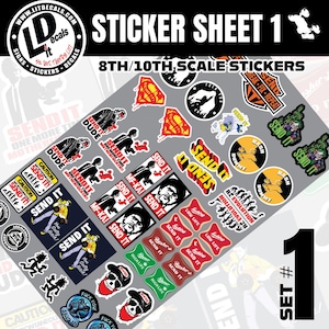 May include: A sticker sheet with various designs, including text like "SEND IT," "DUDE," and "FUCK YOU." The stickers feature images of people, skulls, and other graphics. The sheet is labeled "STICKER SHEET 1."