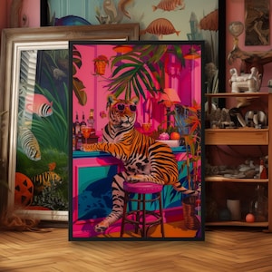 May include: A framed print of a tiger sitting on a bar stool in a tropical setting. The tiger is wearing a pink collar and has a pink drink in its paw. The background is a pink and green tropical scene with palm trees and flowers.