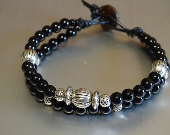 Multi strand leather black Onyx beads handmade bracelet. Silver round, oval and disk beads. Coconut button. One of a kind. large wrist size