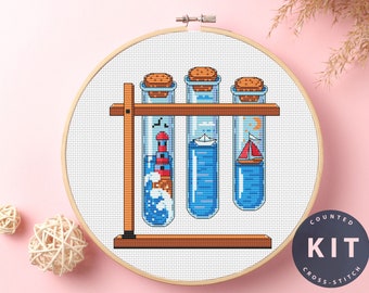 Zestaw do haftu krzyżykowego „Probówki”: Latarnia morska, łódź, wzór księżyca