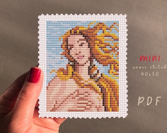 May include: A cross stitch pattern of a woman with flowing hair, in a mini size, 40x50 stitches. The pattern is in PDF format.