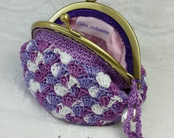 Handmade crochet purse with vintage-style metal nozzle closure in nuanced lilac tones