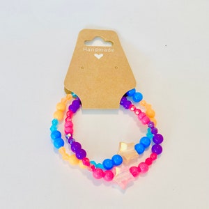 A pair of beaded bracelet for girls