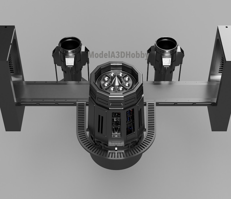 May include: A detailed, gray model of a futuristic, industrial structure. The central octagonal core features a series of lights and intricate paneling. Two cylindrical components are connected by a platform, with the text "modelA3DHobby" visible.