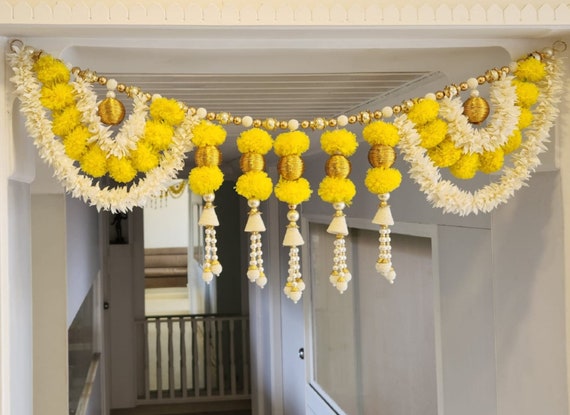 Lotus and marigold door garland with tassels