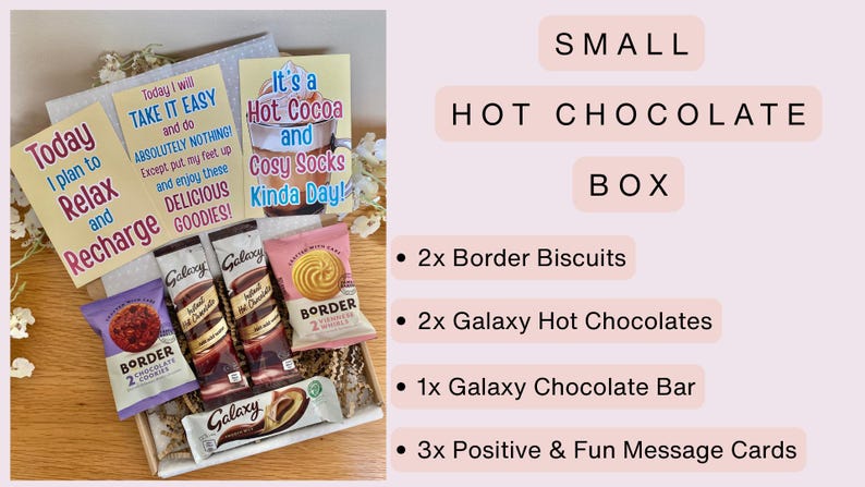 May include: A small hot chocolate box containing two Border biscuits, two Galaxy hot chocolate sachets, one Galaxy chocolate bar, and three message cards with text including Today I plan to Relax and Recharge, Take It Easy, and It's a Hot Cocoa and Cosy Socks Kinda Day.