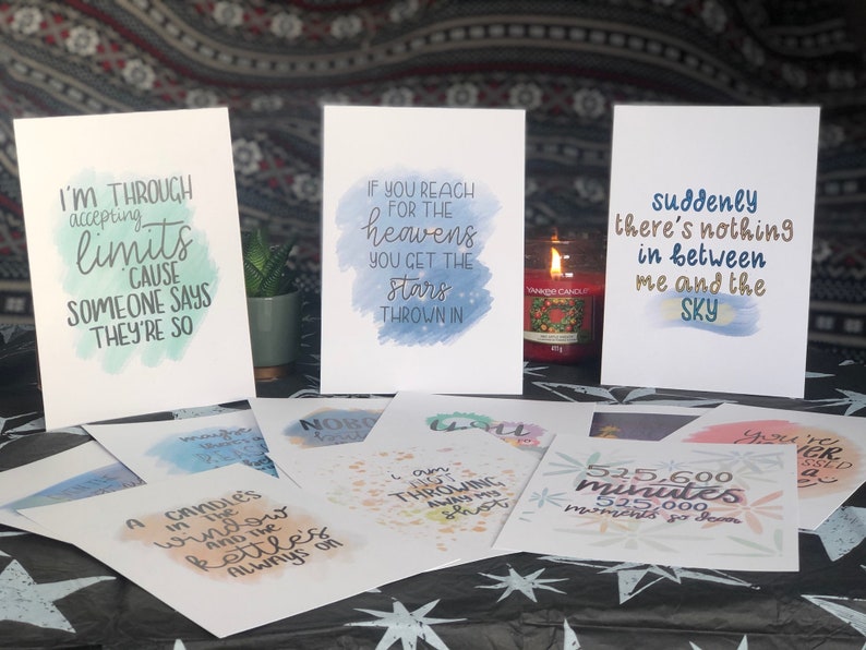 May include: A set of 10 watercolor prints with inspirational quotes. The prints feature a variety of colors, including blue, green, pink, and yellow. The quotes are printed in black ink and are easy to read. The prints are perfect for adding a touch of inspiration to any room.