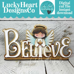May include: Wooden sign with the word "Believe" in a layered design. The sign features a cartoon angel holding a star, with a gold halo and wings. The sign is on a wooden base.