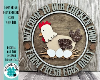 May include: A round wooden sign with a white border and the text "Welcome to our Chicken Coop Farm Fresh Eggs Daily". A brown and white chicken with red accents is in the center of the sign, sitting on a nest of straw with white eggs.