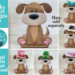 May include: A wooden dog cutout with brown and tan coloring, featuring a large black nose and pink paw pads. The image includes several variations of the dog wearing different hats. Text on the left reads "Lucky Heart Designs Co" and "Digital cut file instant download."