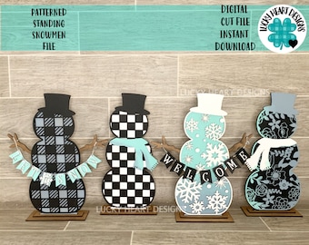 May include: Four patterned standing snowman cut files. The snowmen are decorated with black and white checkered, blue and white snowflake, and black and white floral patterns. The snowmen are holding banners that read "Let it Snow" and "Welcome".