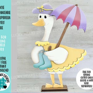 May include: A digital cut file for a goose with a purple and yellow spring outfit, holding a purple and white umbrella. The file is for a spring outfit only, goose and hats sold separately.