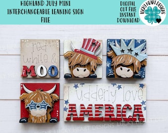 May include: Four wooden signs with a Highland cow theme. The signs feature a red, white, and blue color scheme with the text "red white & moo", "I udderly love AMERICA", and two Highland cows wearing patriotic hats.